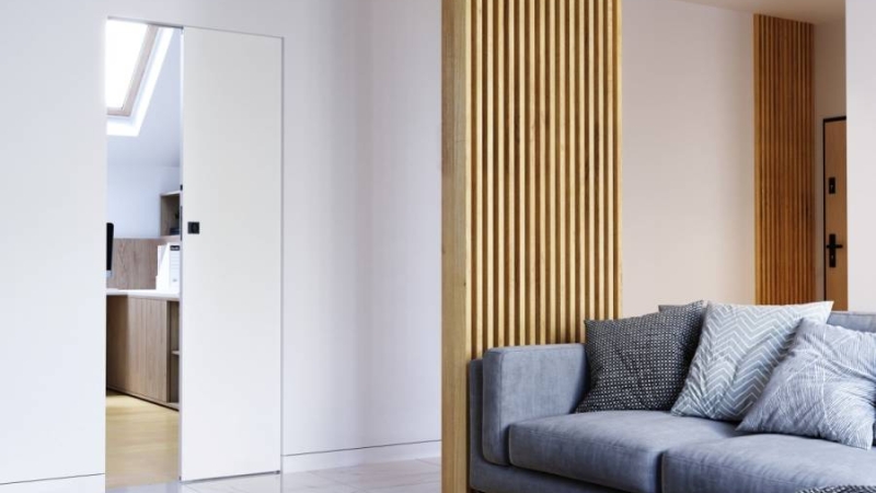 Drzwi ukryte w ścianie – elegancja i funkcjonalność w T